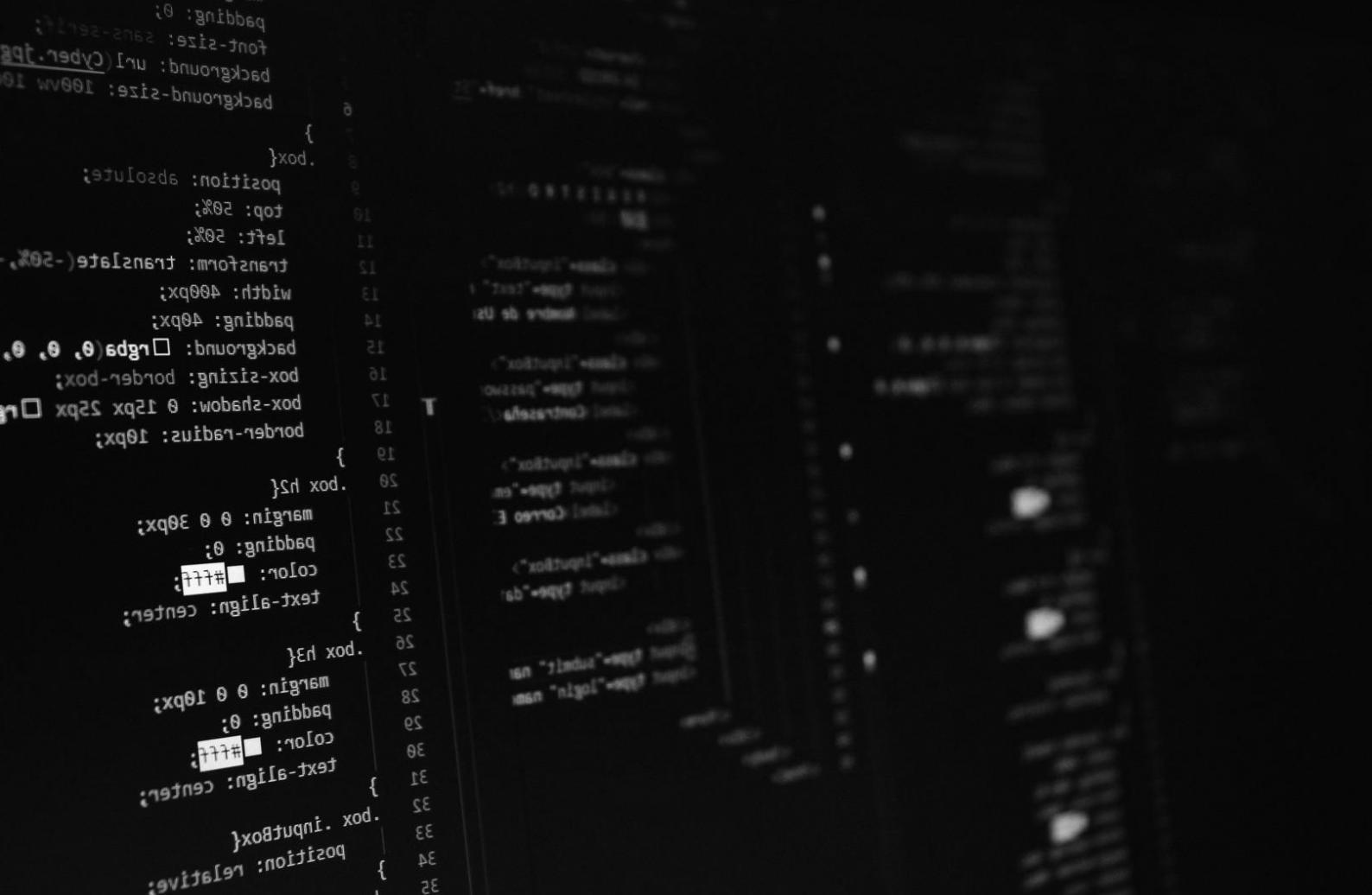 Mobile app development workspace showing code, design mockups, and testing devices